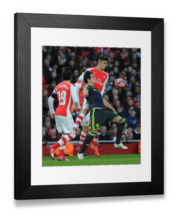 Framed Print : Gabriel (Arsenal) Kike (Middlesbrough). Arsenal 2: 0 Middlesbrough. FA Cup 5th Round