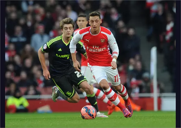 Mesut Ozil (Arsenal) Patrick Bamford (Middlesbrough). Arsenal 2: 0 Middlesbrough. FA Cup 5th Round