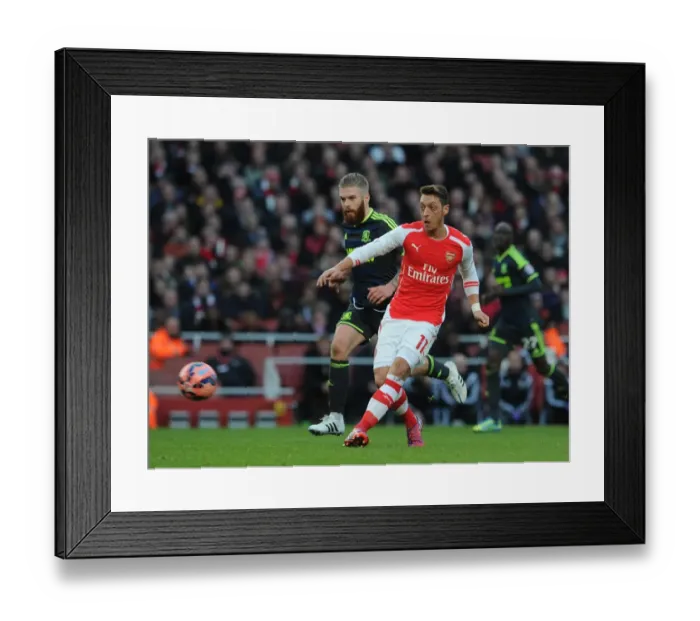 Framed Print : Mesut Ozil (Arsenal) Adam Clayton (Middlesbrough). Arsenal 2: 0 Middlesbrough. FA Cup 5th Round