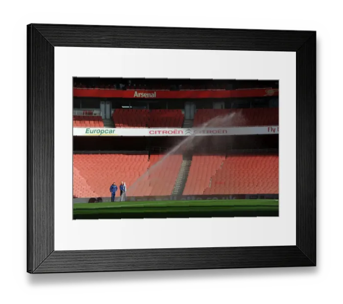 Framed Print : The pitch is watered before the match. Arsenal 2: 0 Middlesbrough. FA Cup 5th Round