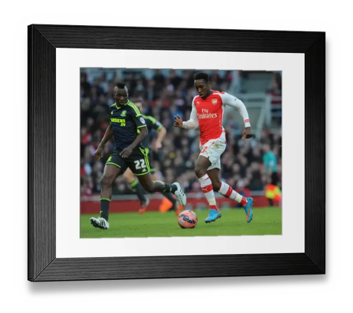 Framed Print : Danny Welbeck Charges Past Kenneth Omerou in FA Cup Clash: Arsenal vs. Middlesbrough