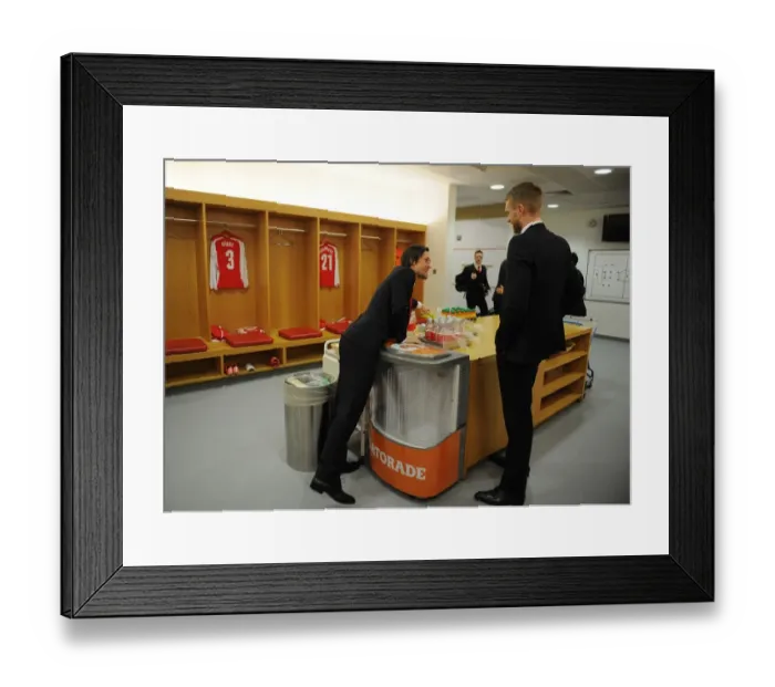 Framed Print : Arsenal FC: Rosicky and Mertesacker in the Home Changing Room before FA Cup Fifth Round Match vs Middlesbrough