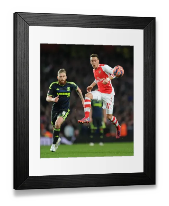 Framed Print : Mesut Ozil Breaks Past Middlesbrough's Defence in FA Cup Fifth Round Clash