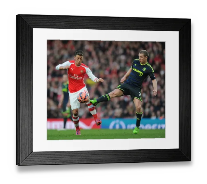 Framed Print : FA Cup Showdown: Ozil vs Leadbitter - Arsenal vs Middlesbrough Battle Framed Print : FA Cup Showdown: Ozil vs Leadbitter - Arsenal vs Middlesbrough Battle
