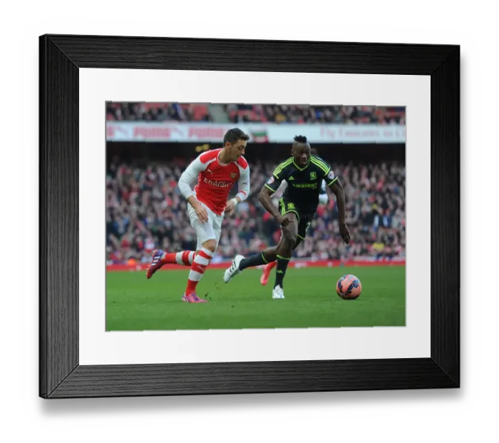 Framed Print : Mesut Ozil's Magic: Outsmarting Albert Adomah in Arsenal's FA Cup Triumph Framed Print : Mesut Ozil's Magic: Outsmarting Albert Adomah in Arsenal's FA Cup Triumph