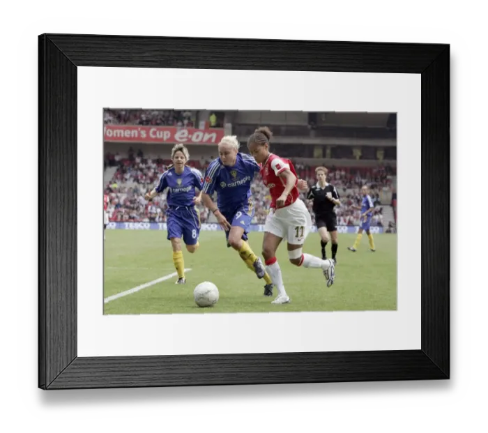 Framed Print : Arsenal's Yankey and Houghton Lead: FA Womens Cup Final Victory (4-1) over Leeds Framed Print : Arsenal's Yankey and Houghton Lead: FA Womens Cup Final Victory (4-1) over Leeds