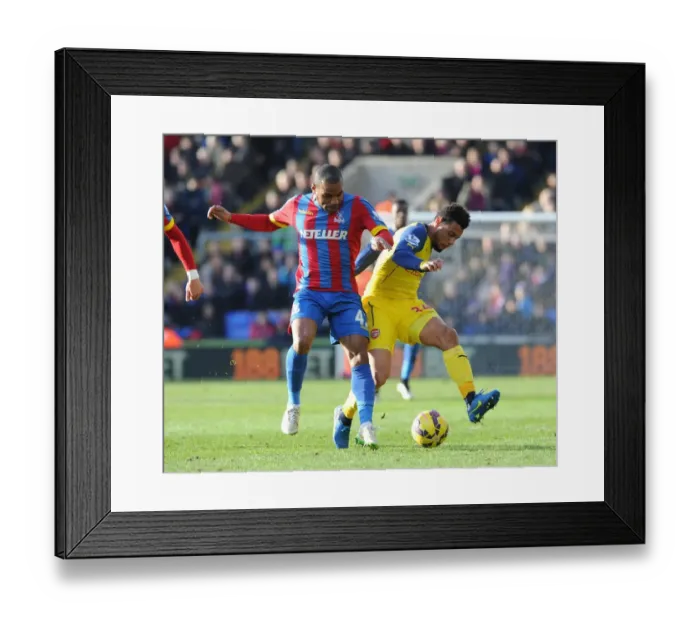 Framed Print : Coquelin vs. Puncheon: Intense Battle in Crystal Palace vs. Arsenal Premier League Clash Framed Print : Coquelin vs. Puncheon: Intense Battle in Crystal Palace vs. Arsenal Premier League Clash