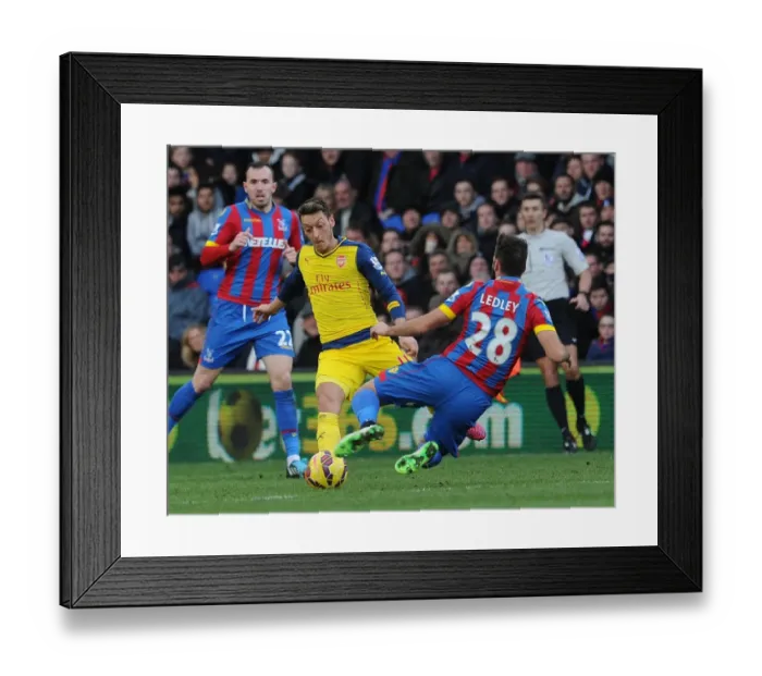 Framed Print : Mesut Ozil vs Joe Ledley: Intense Battle at Crystal Palace vs Arsenal, Premier League 2014-15 Framed Print : Mesut Ozil vs Joe Ledley: Intense Battle at Crystal Palace vs Arsenal, Premier League 2014-15