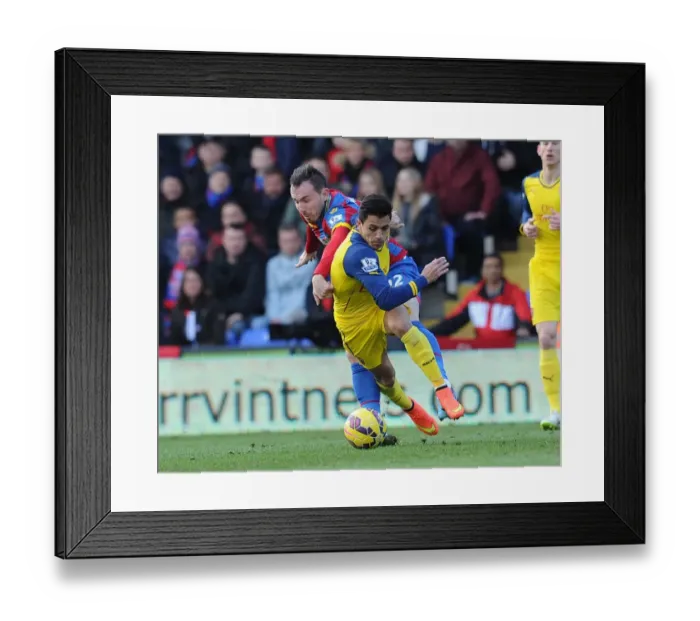 Framed Print : Clash of Stars: Sanchez vs. Mutch in Crystal Palace vs. Arsenal Premier League Showdown
