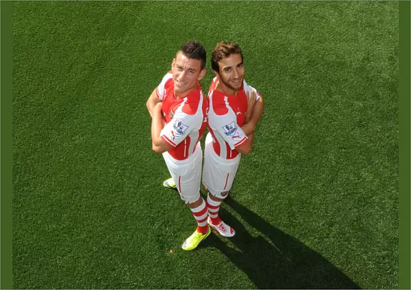 Arsenal First Team: Koscielny and Flamini at Emirates Stadium, 2014