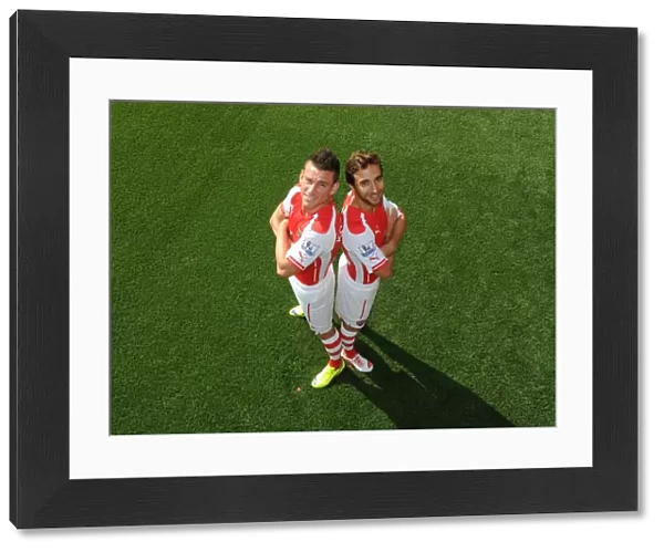 Arsenal First Team: Koscielny and Flamini at Emirates Stadium, 2014