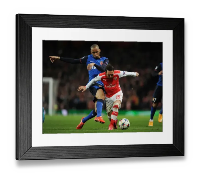 Framed Print : Clash of Midfield Titans: Cazorla vs Fabinho - Arsenal's Battle in the UEFA Champions League Framed Print : Clash of Midfield Titans: Cazorla vs Fabinho - Arsenal's Battle in the UEFA Champions League