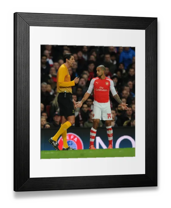 Framed Print : Theo Walcott's Dispute with Referee Deniz Aytekin during Arsenal vs AS Monaco UEFA Champions League Match Framed Print : Theo Walcott's Dispute with Referee Deniz Aytekin during Arsenal vs AS Monaco UEFA Champions League Match