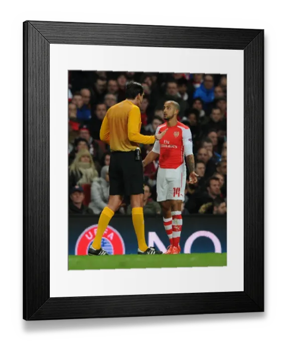 Framed Print : Theo Walcott Protests to Referee Deniz Aytekin during Arsenal vs AS Monaco UEFA Champions League Match Framed Print : Theo Walcott Protests to Referee Deniz Aytekin during Arsenal vs AS Monaco UEFA Champions League Match