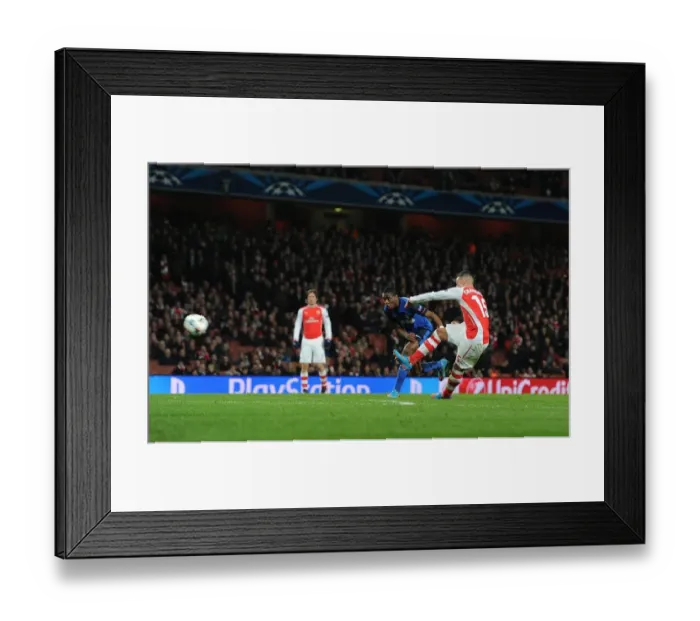 Framed Print : Alex Oxlade-Chamberlain Scores the Decisive Goal: Arsenal vs AS Monaco, UEFA Champions League Round of 16