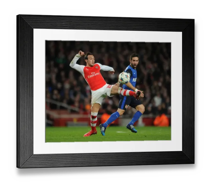 Framed Print : Clash of Midfield Masters: Cazorla vs. Moutinho - Arsenal's UEFA Champions League Showdown against Monaco Framed Print : Clash of Midfield Masters: Cazorla vs. Moutinho - Arsenal's UEFA Champions League Showdown against Monaco