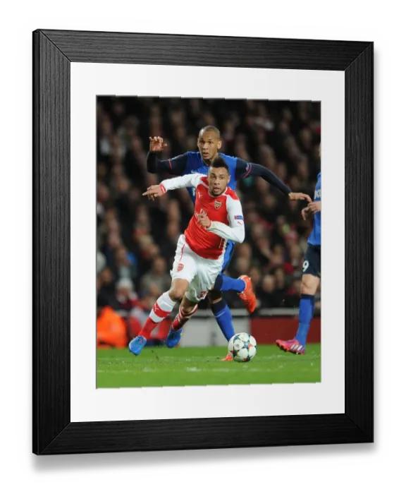 Framed Print : Clash of Midfielders: Coquelin vs Fabinho in Arsenal's UEFA Champions League Battle against Monaco Framed Print : Clash of Midfielders: Coquelin vs Fabinho in Arsenal's UEFA Champions League Battle against Monaco