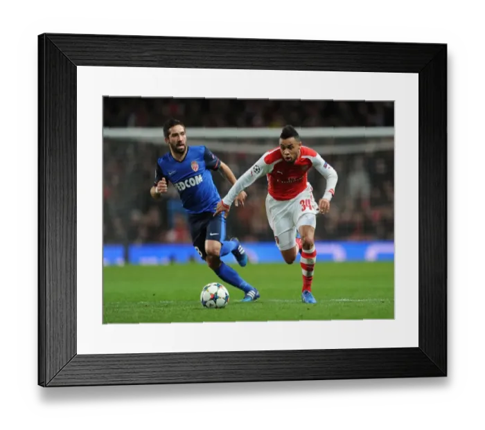 Framed Print : Arsenal's Coquelin Clashes with Monaco's Moutinho in Champions League Showdown