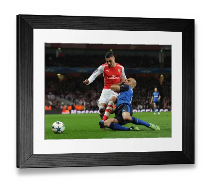 Framed Print : Clash of Champions: Oxlade-Chamberlain vs. Abdennour in Arsenal's UEFA Battle Framed Print : Clash of Champions: Oxlade-Chamberlain vs. Abdennour in Arsenal's UEFA Battle