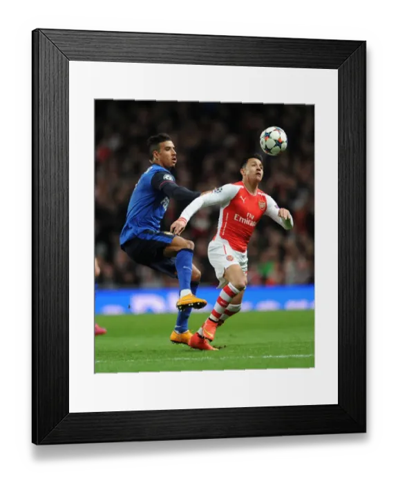 Framed Print : Clash of Stars: Sanchez vs. Dirar in Arsenal's UEFA Champions League Battle against Monaco