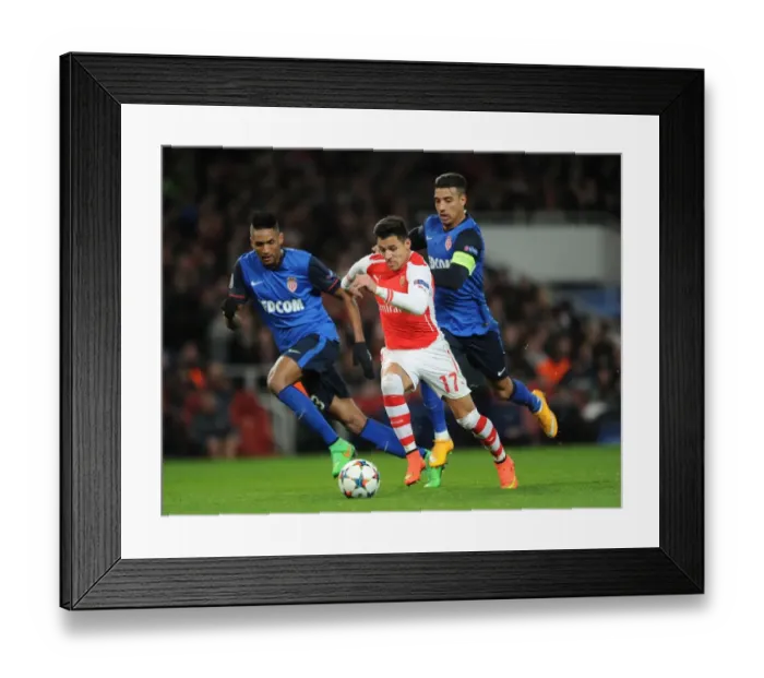 Framed Print : Arsenal's Alexis Sanchez Faces Off Against Monaco's Nabil Dirar and Anthony Martial in UEFA Champions League Showdown Framed Print : Arsenal's Alexis Sanchez Faces Off Against Monaco's Nabil Dirar and Anthony Martial in UEFA Champions League Showdown
