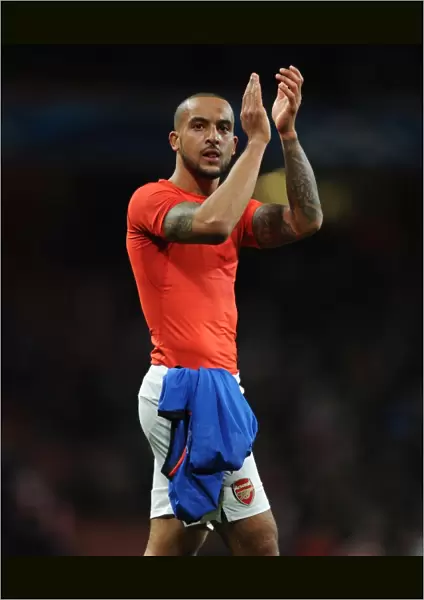 Theo Walcott Celebrates with Arsenal Fans after UEFA Champions League Victory over AS Monaco