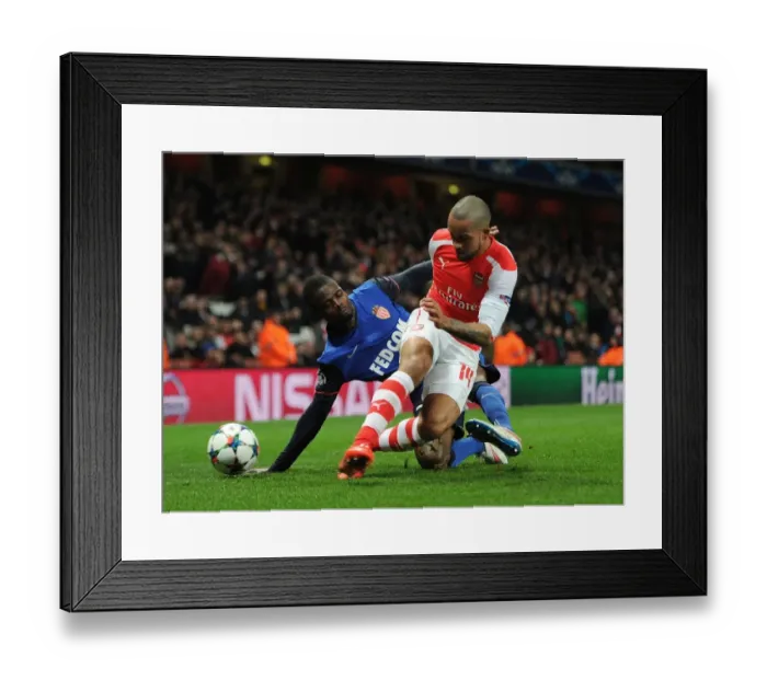 Framed Print : Theo Walcott (Arsenal) Elderson (Monaco). Arsenal 1: 3 AS Monaco. UEFA Champions League Framed Print : Theo Walcott (Arsenal) Elderson (Monaco). Arsenal 1: 3 AS Monaco. UEFA Champions League