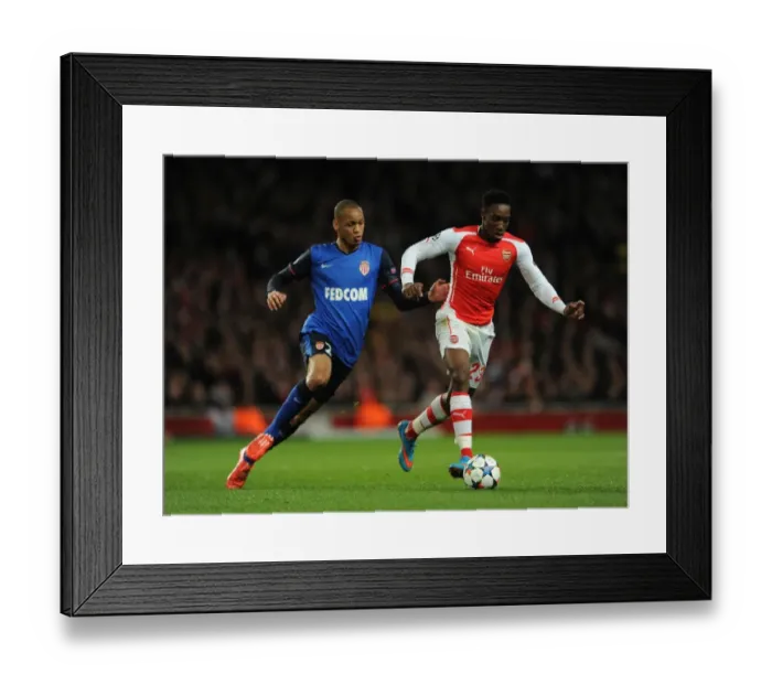 Framed Print : Clash of Forces: Welbeck vs Fabinho in Arsenal's UEFA Champions League Battle against Monaco