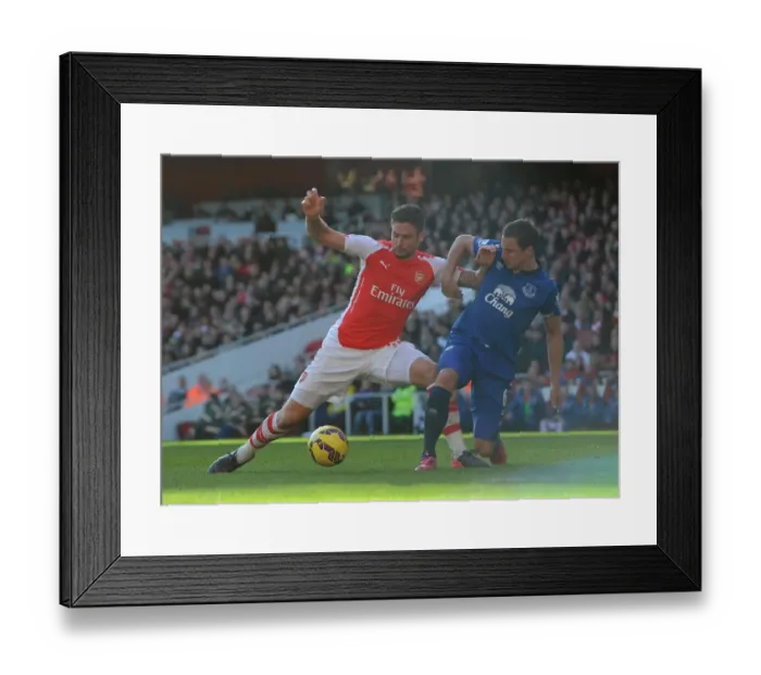 Framed Print : Olivier Giroud (Arsenal) Phil Jagielka (Everton). Arsenal 2: 0 Everton. Barclays Premier League