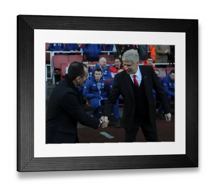 Framed Print : Arsene Wenger the Arsenal Manager shakes hands with Roberto Martinez of Everton. Arsenal 2 Framed Print : Arsene Wenger the Arsenal Manager shakes hands with Roberto Martinez of Everton. Arsenal 2