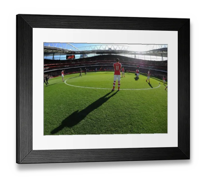 Framed Print : Mesut Ozil: Arsenal's Star Player Ahead of Arsenal vs. Everton, Premier League 2014-15