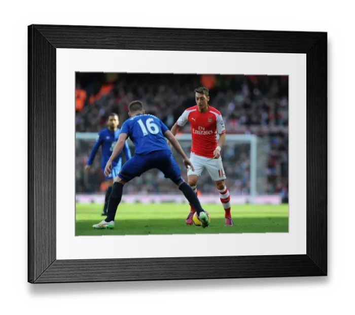 Framed Print : Mesut Ozil Takes on James McCarthy: Arsenal vs. Everton, Premier League 2014-15 Framed Print : Mesut Ozil Takes on James McCarthy: Arsenal vs. Everton, Premier League 2014-15