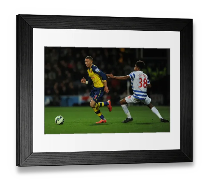 Framed Print : Arsenal's Kieran Gibbs Outruns QPR's Darnell Furlong in Premier League Clash Framed Print : Arsenal's Kieran Gibbs Outruns QPR's Darnell Furlong in Premier League Clash