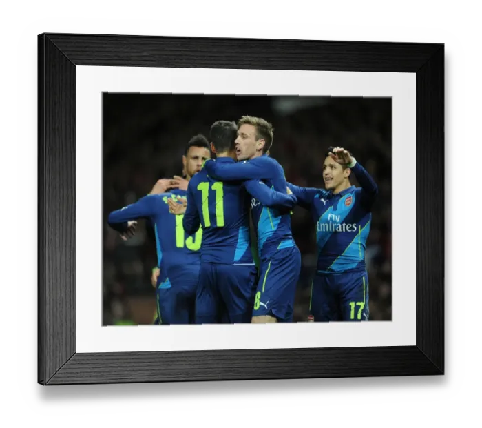 Framed Print : Nacho Monreal celebrates scoring Arsenals 1st goal with Mesut Ozil. Manchester United 1: 2 Arsenal Framed Print : Nacho Monreal celebrates scoring Arsenals 1st goal with Mesut Ozil. Manchester United 1: 2 Arsenal
