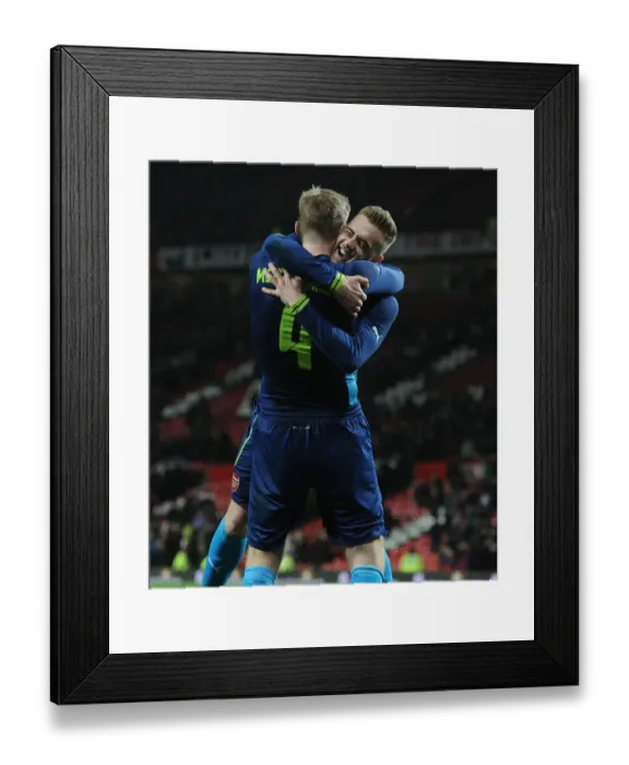 Framed Print : Arsenal's Per Mertesacker and Calum Chambers Celebrate FA Cup Quarterfinal Victory over Manchester United Framed Print : Arsenal's Per Mertesacker and Calum Chambers Celebrate FA Cup Quarterfinal Victory over Manchester United
