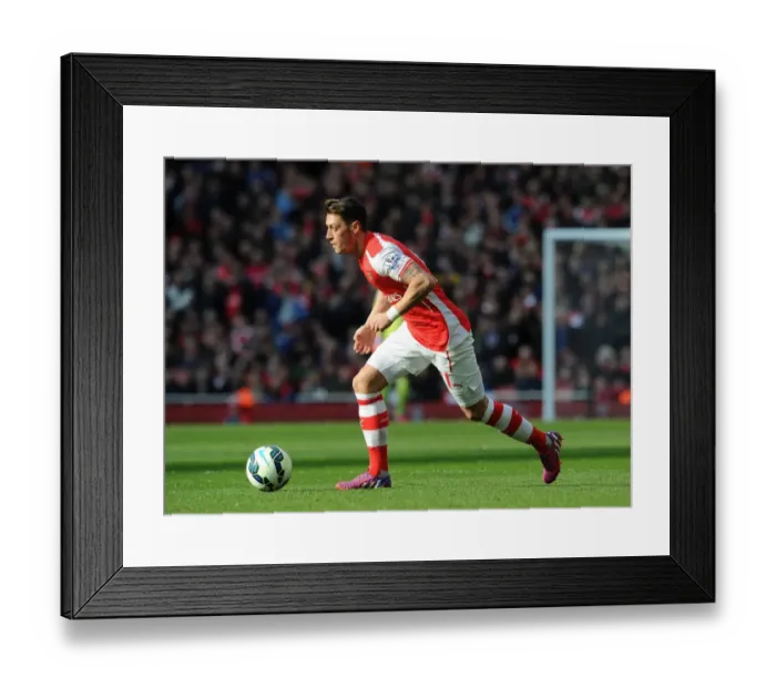 Framed Print : Mesut Ozil: In Action for Arsenal Against West Ham United, Premier League 2014-2015