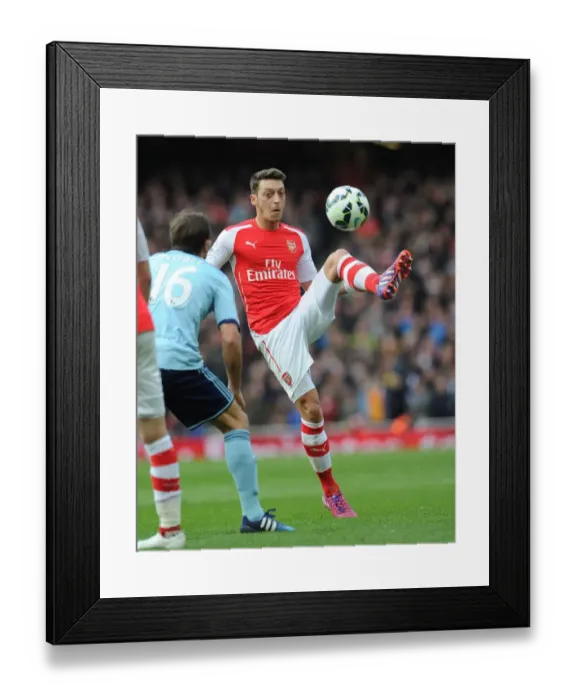 Framed Print : Mesut Ozil vs Mark Noble: Battle for Midfield Supremacy - Arsenal v West Ham United, Premier League 2015