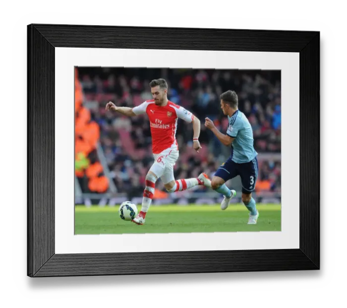 Framed Print : Aaron Ramsey (Arsenal) Aaron Creswell (West Ham). Arsenal 3: 0 West Ham United. Barclays