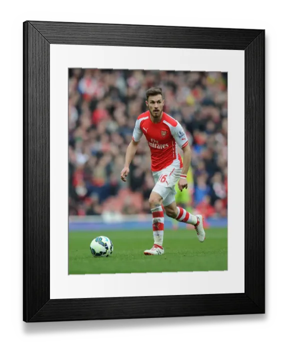 Framed Print : Arsenal's Aaron Ramsey Fights for Possession against West Ham United in the Premier League Framed Print : Arsenal's Aaron Ramsey Fights for Possession against West Ham United in the Premier League
