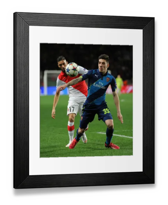 Framed Print : Hector Bellerin vs Yannick Ferreira-Carrasco: Intense Battle at Monaco's Stade Louis II - Arsenal vs Monaco, UEFA Champions League Round of 16
