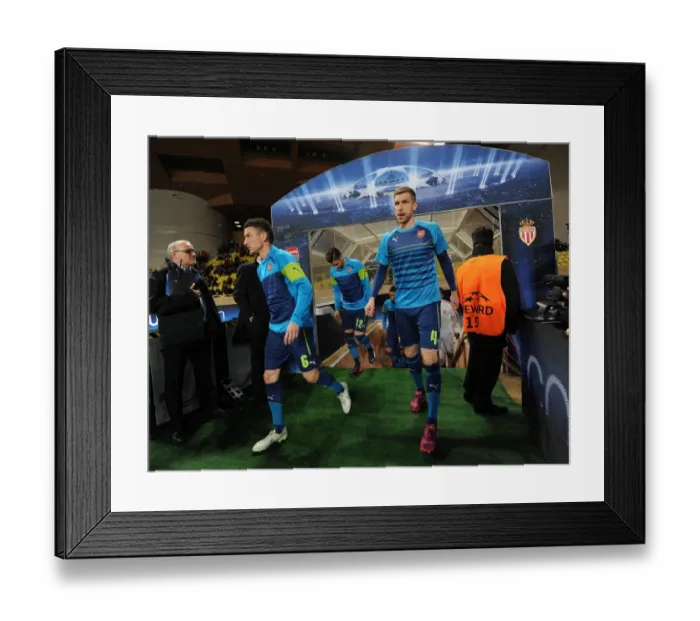 Framed Print : Arsenal's Mertesacker and Koscielny Prepare for Monaco Showdown in Champions League Framed Print : Arsenal's Mertesacker and Koscielny Prepare for Monaco Showdown in Champions League