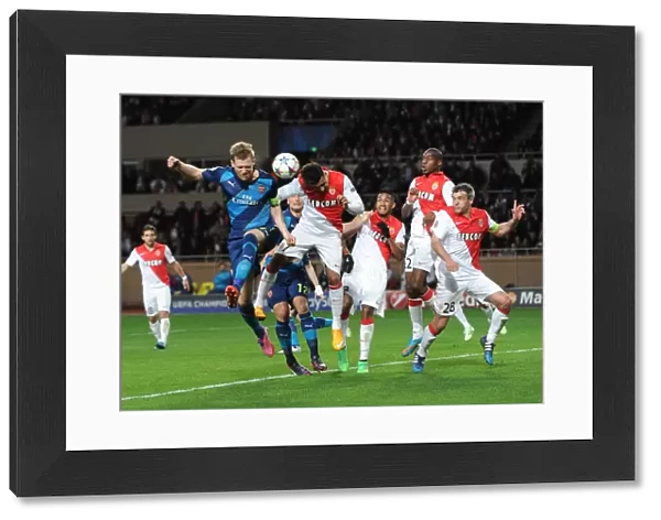 Per Mertesacker (Arsenal) Nabil Dirar (Monaco). AS Monaco 0: 2 Arsenal. UEFA Champions League