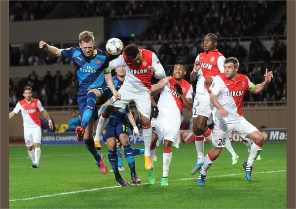 Per Mertesacker (Arsenal) Nabil Dirar (Monaco). AS Monaco 0: 2 Arsenal. UEFA Champions League