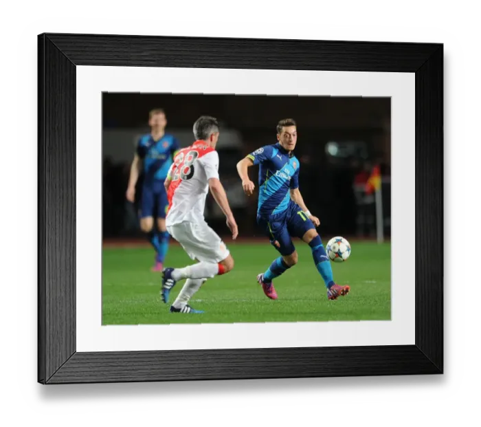 Framed Print : Mesut Ozil vs. Jeremy Toulalan: Battle in the Midfield - Monaco vs. Arsenal, UEFA Champions League 2015