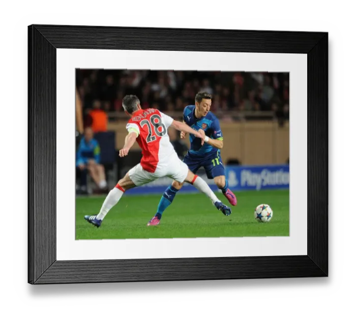 Framed Print : Mesut Ozil Outmaneuvers Jeremy Toulalan: Monaco vs. Arsenal, UEFA Champions League Round of 16