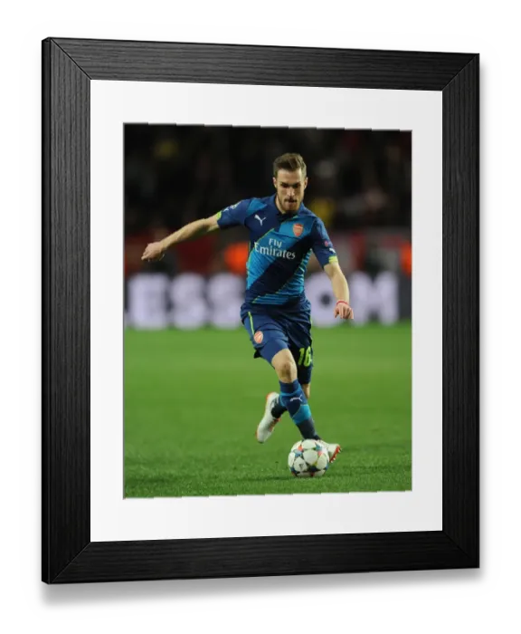 Framed Print : Aaron Ramsey (Arsenal). AS Monaco 0: 2 Arsenal. UEFA Champions League. Round of 16, 2nd Leg