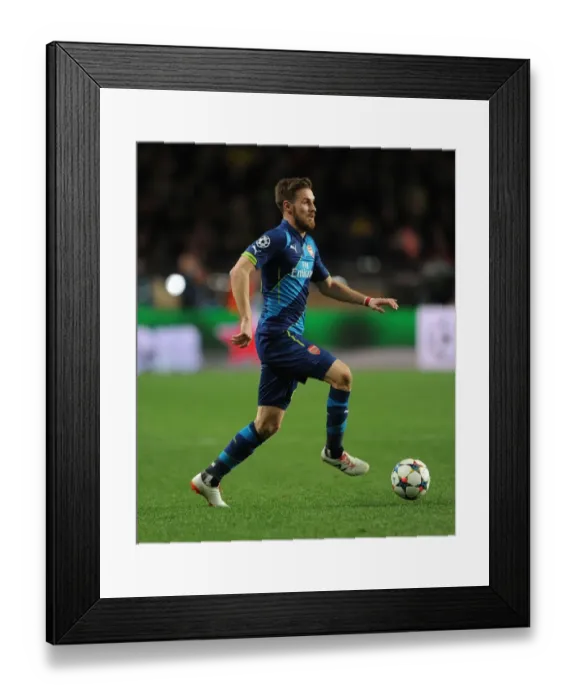 Framed Print : Aaron Ramsey in Action: Arsenal vs. AS Monaco, UEFA Champions League Round of 16 (March 2015)
