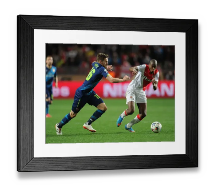 Framed Print : Clash of Midfield Titans: Ramsey vs. Kondogbia - Monaco vs. Arsenal, UEFA Champions League 2015