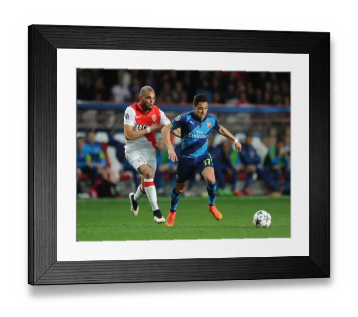 Framed Print : Clash of Stars: Alexis Sanchez vs. Layvin Kurzawa - Monaco vs. Arsenal, UEFA Champions League 2015 Framed Print : Clash of Stars: Alexis Sanchez vs. Layvin Kurzawa - Monaco vs. Arsenal, UEFA Champions League 2015