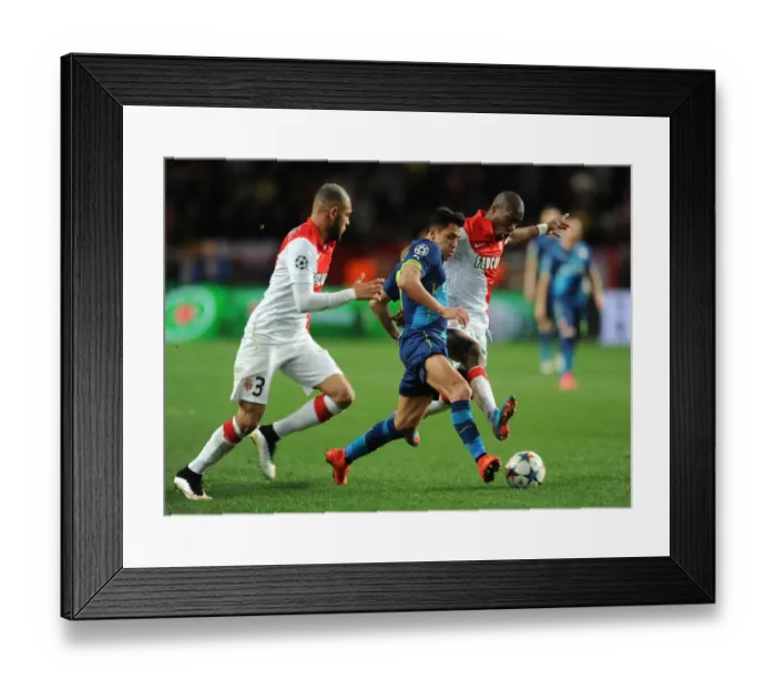 Framed Print : Clash of Stars: Sanchez vs. Kondogbia, Kurzawa - Monaco vs. Arsenal, UEFA Champions League